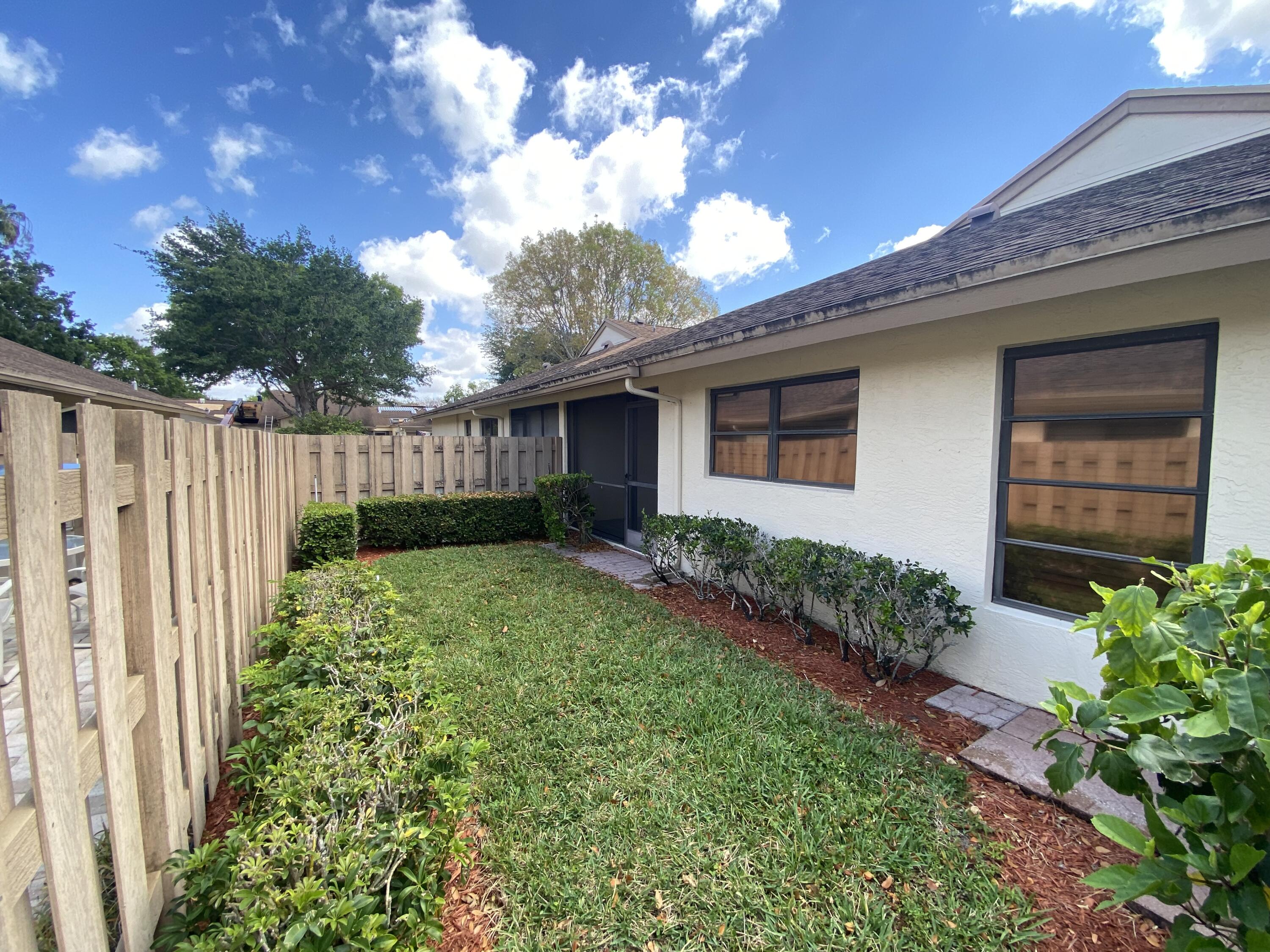 8095 Windgate Drive Boca Raton, FL 33496 - Photo 26 of 28 Side Yard