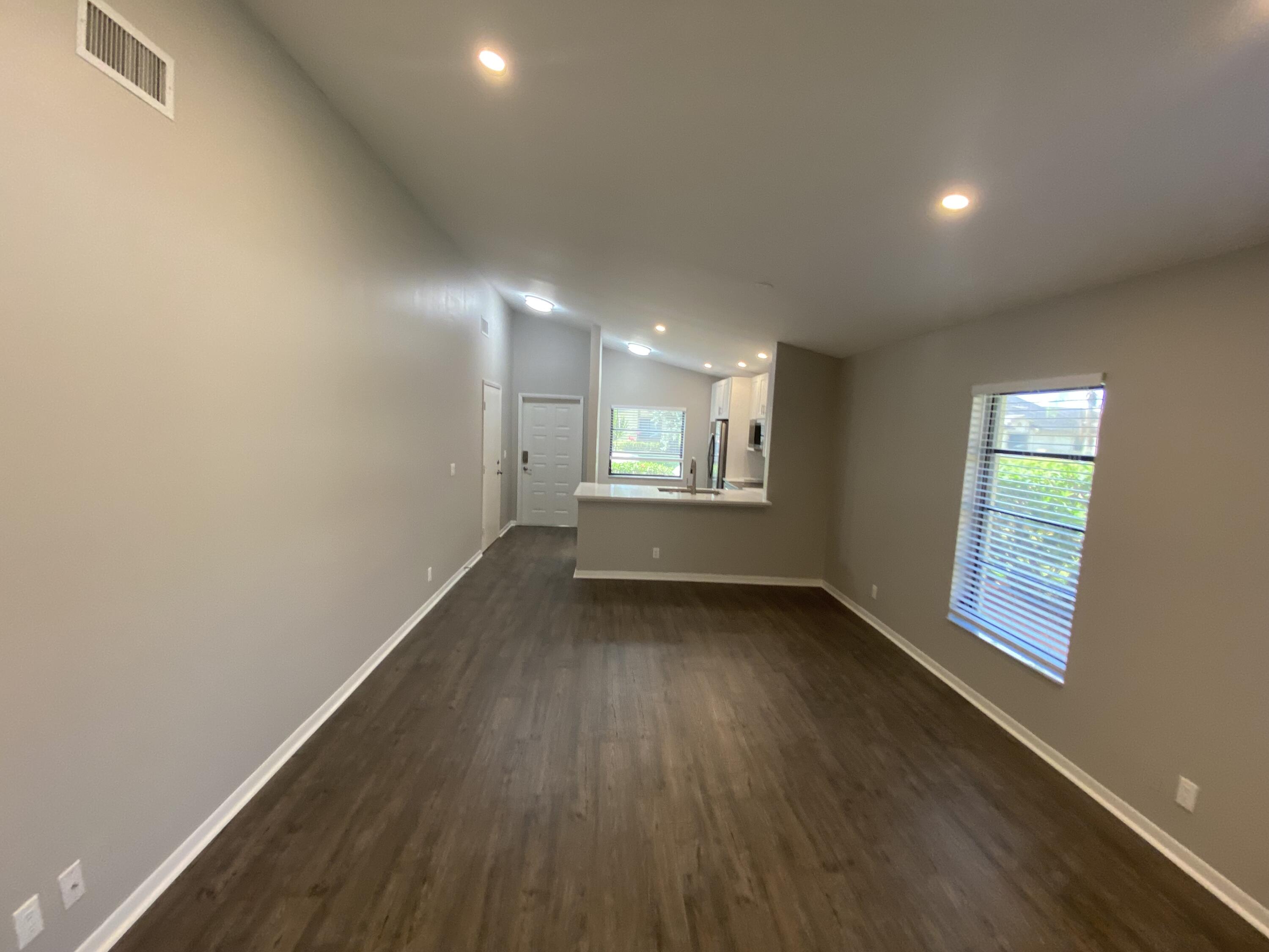 8095 Windgate Drive Boca Raton, FL 33496 - Photo 4 of 28 Living Room/Dining Room