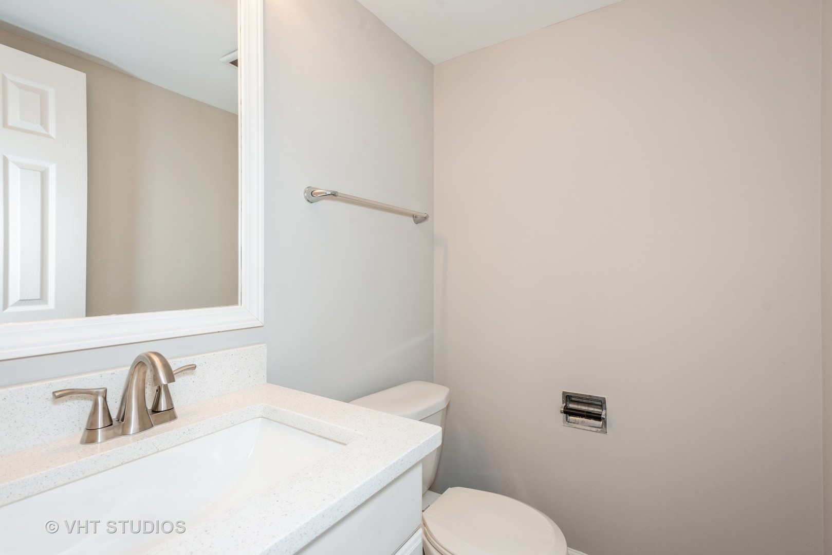 258 East Bailey Road, Unit H Naperville, IL 60565 - Photo 5 of 13 a bathroom with a sink and a toilet