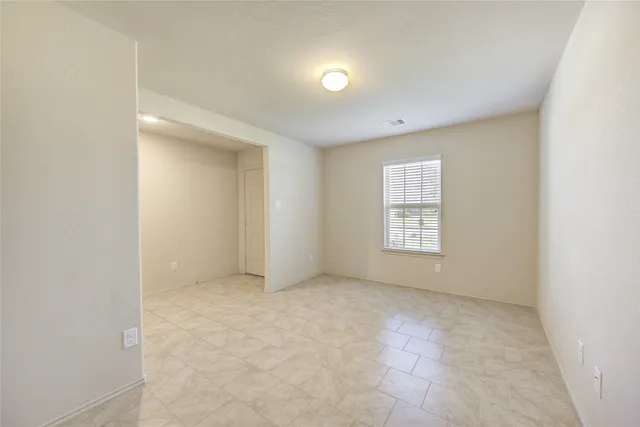 an empty room with windows