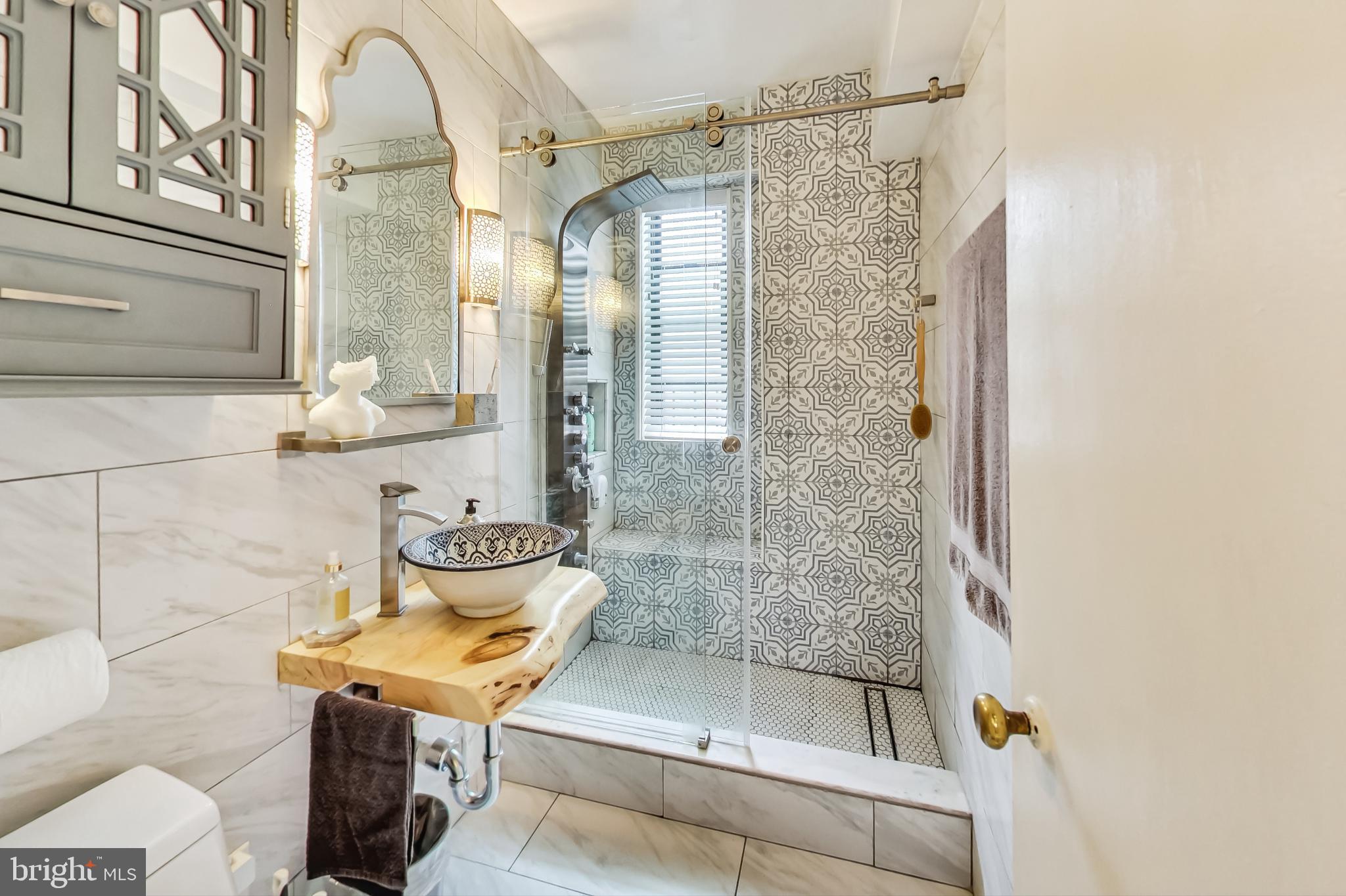 1 Scott Circle Northwest, Unit 20 Washington, DC 20005 - Photo 20 of 37 a bathroom with a bathtub and shower