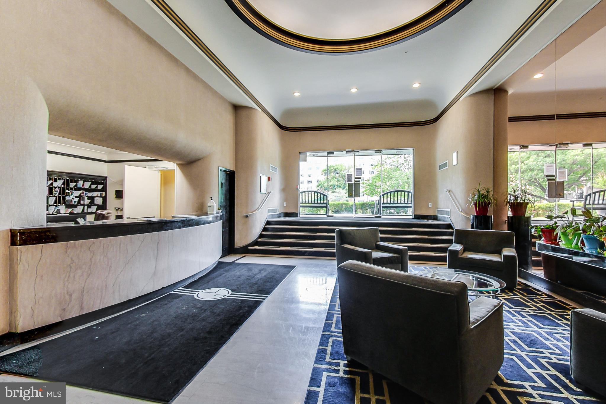 1 Scott Circle Northwest, Unit 20 Washington, DC 20005 - Photo 2 of 37 a kitchen with stainless steel appliances granite countertop a stove a sink and a refrigerator