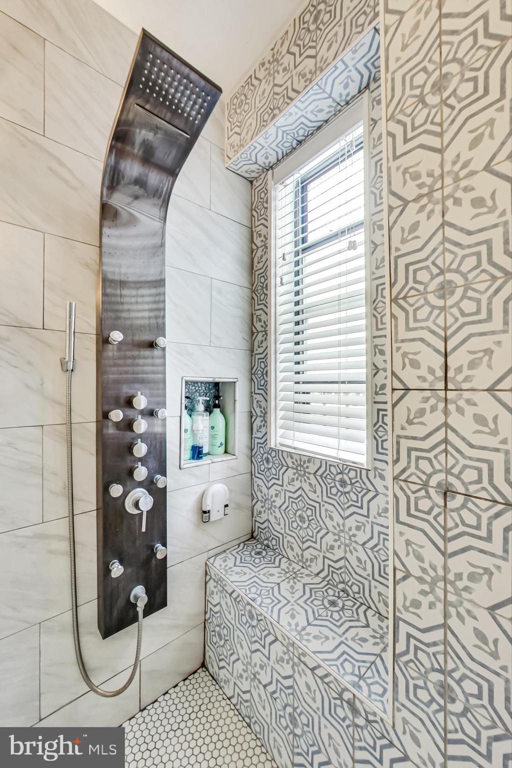 1 Scott Circle Northwest, Unit 20 Washington, DC 20005 - Photo 21 of 37 a bathroom with a bathtub and shower