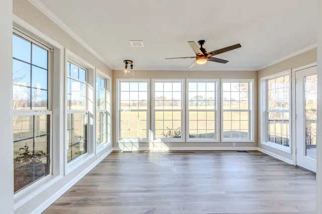 a view of a bathroom from a hallway