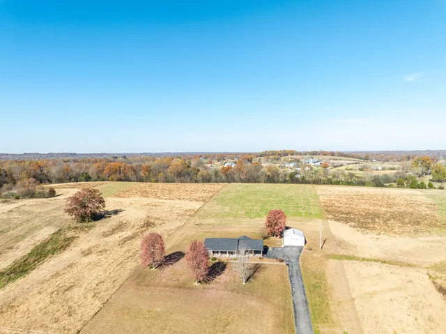 a view of a swimming pool and an outdoor space