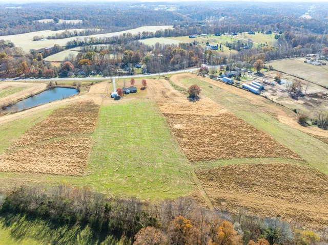 a picture of a room with a small refrigerator