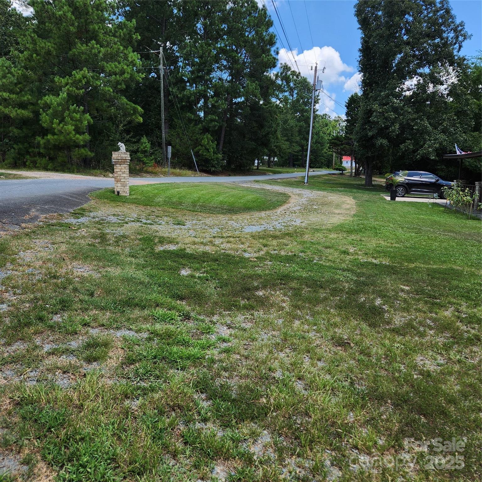 359 Martin Street Ansonville, NC 28170 - Photo 1 of 1 a view of a park with large trees