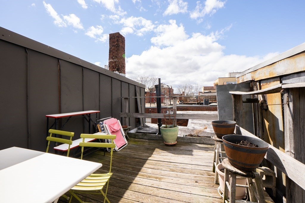 11 Irving Street, Unit 6 Boston, MA 02114 - Photo 13 of 14 a outdoor view with a sitting space