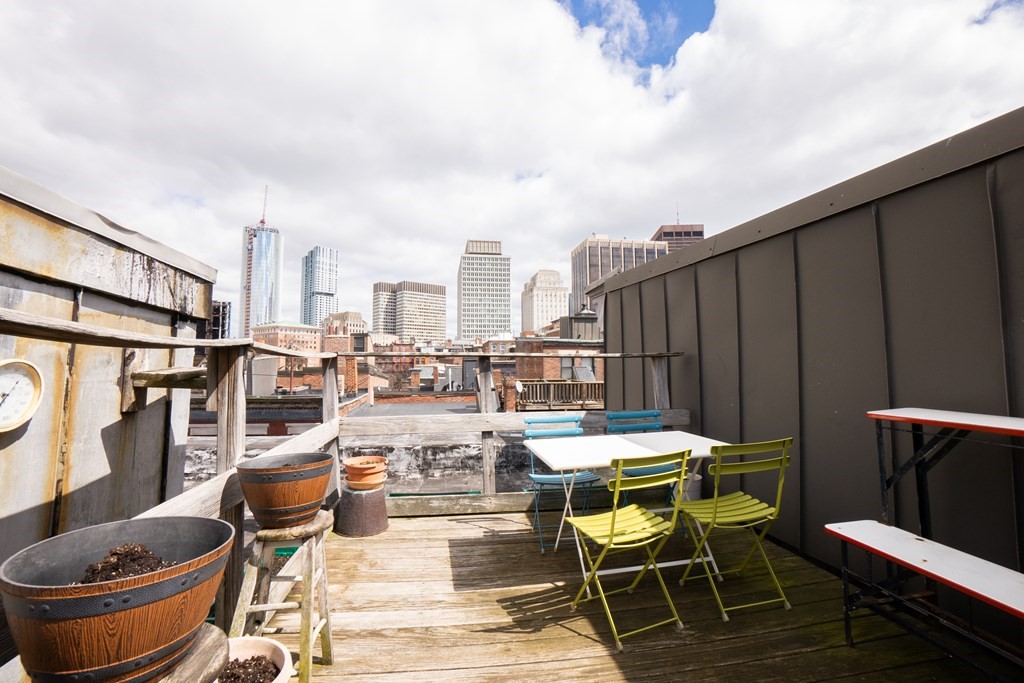 11 Irving Street, Unit 6 Boston, MA 02114 - Photo 14 of 14 a outdoor space with lots of tables and chairs