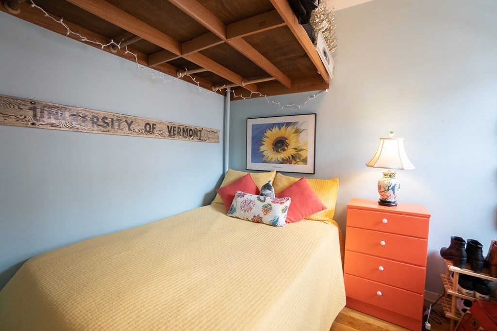 11 Irving Street, Unit 6 Boston, MA 02114 - Photo 8 of 14 a bedroom with a bed and a closet