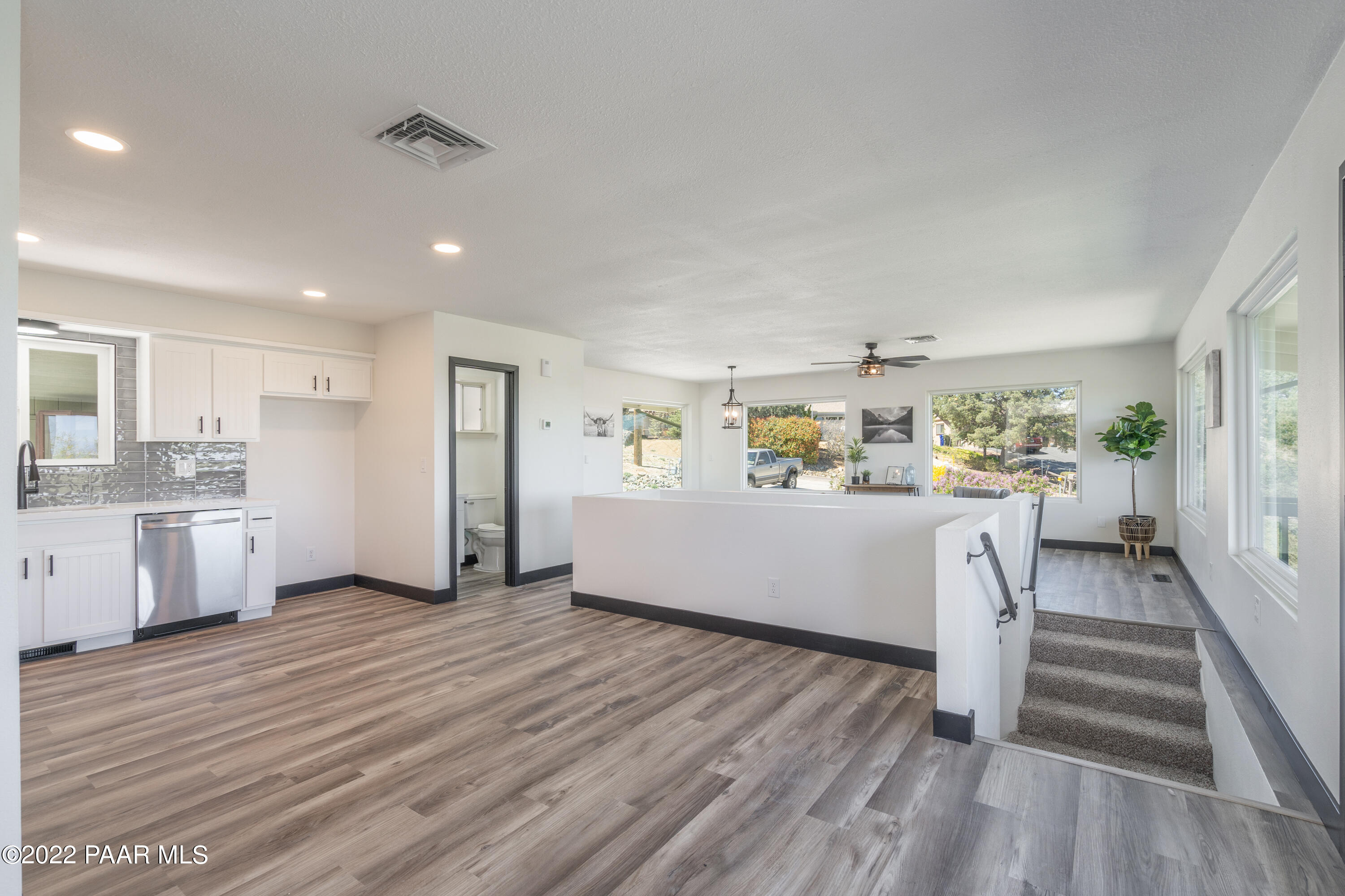 2615 Ridge Road Prescott, AZ 86301 - Photo 13 of 29 a living room with stainless steel appliances kitchen island hardwood floor and a sink