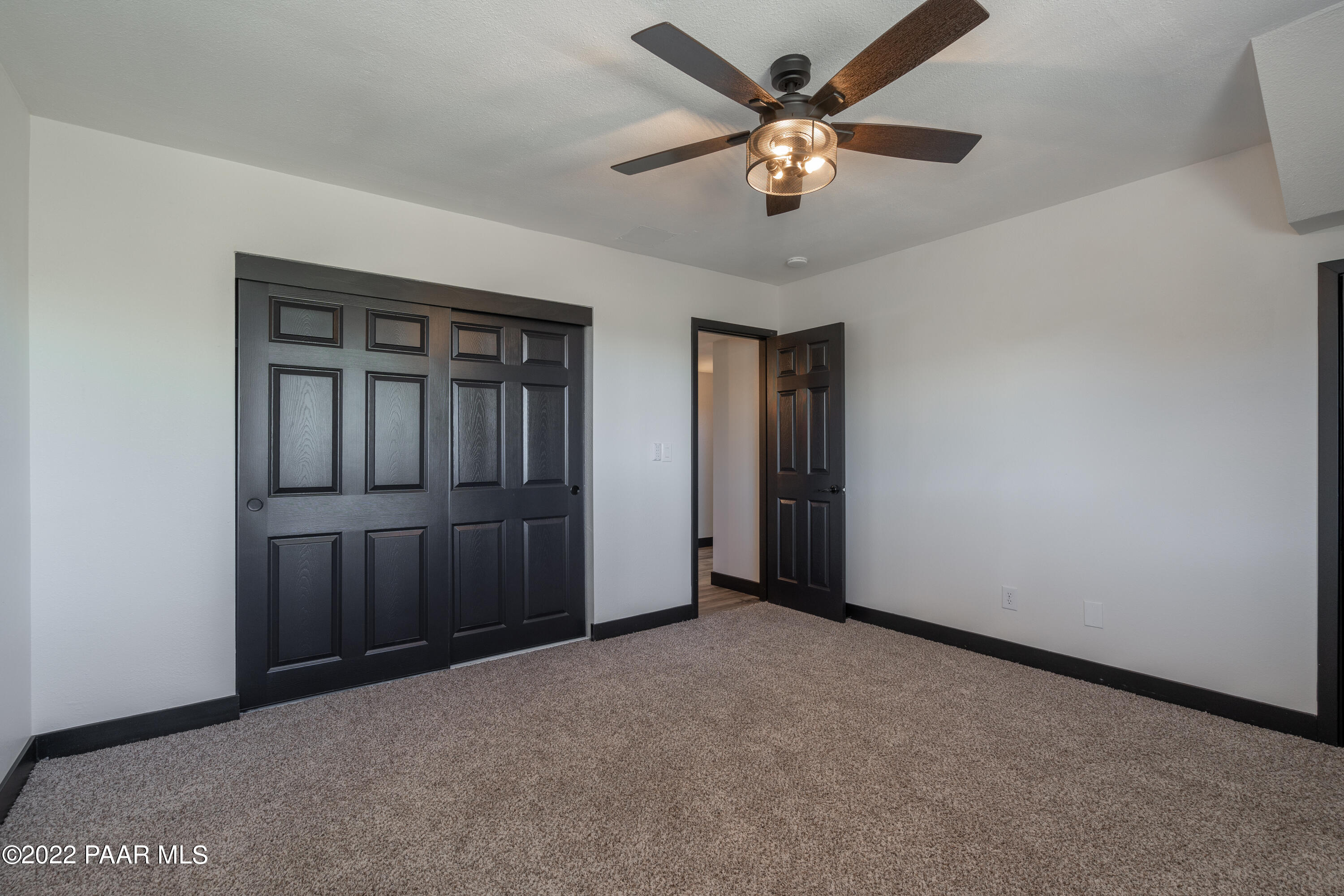 2615 Ridge Road Prescott, AZ 86301 - Photo 19 of 29 an empty room with closet and windows
