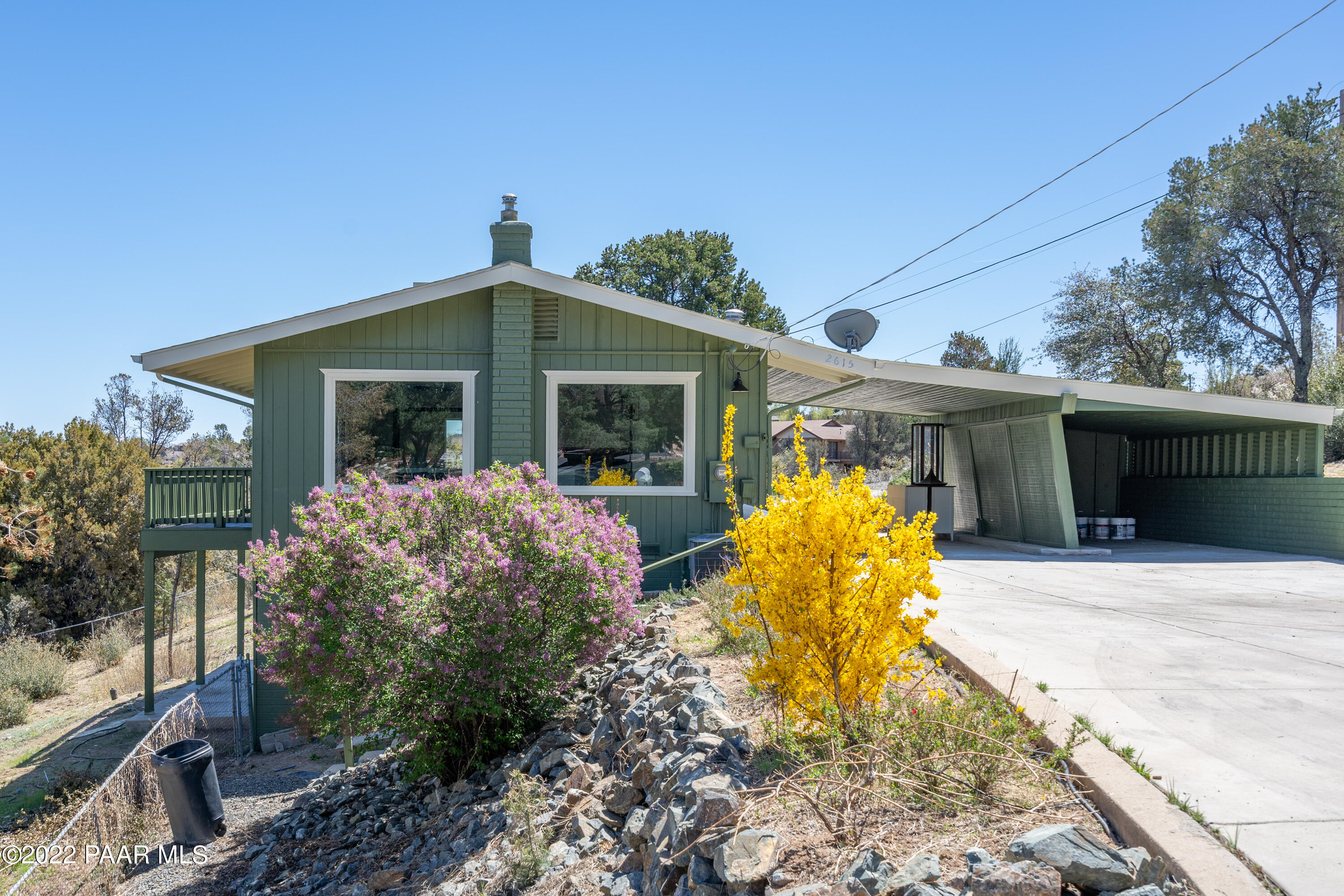 2615 Ridge Road Prescott, AZ 86301 - Photo 4 of 29 a front view of a house with garden