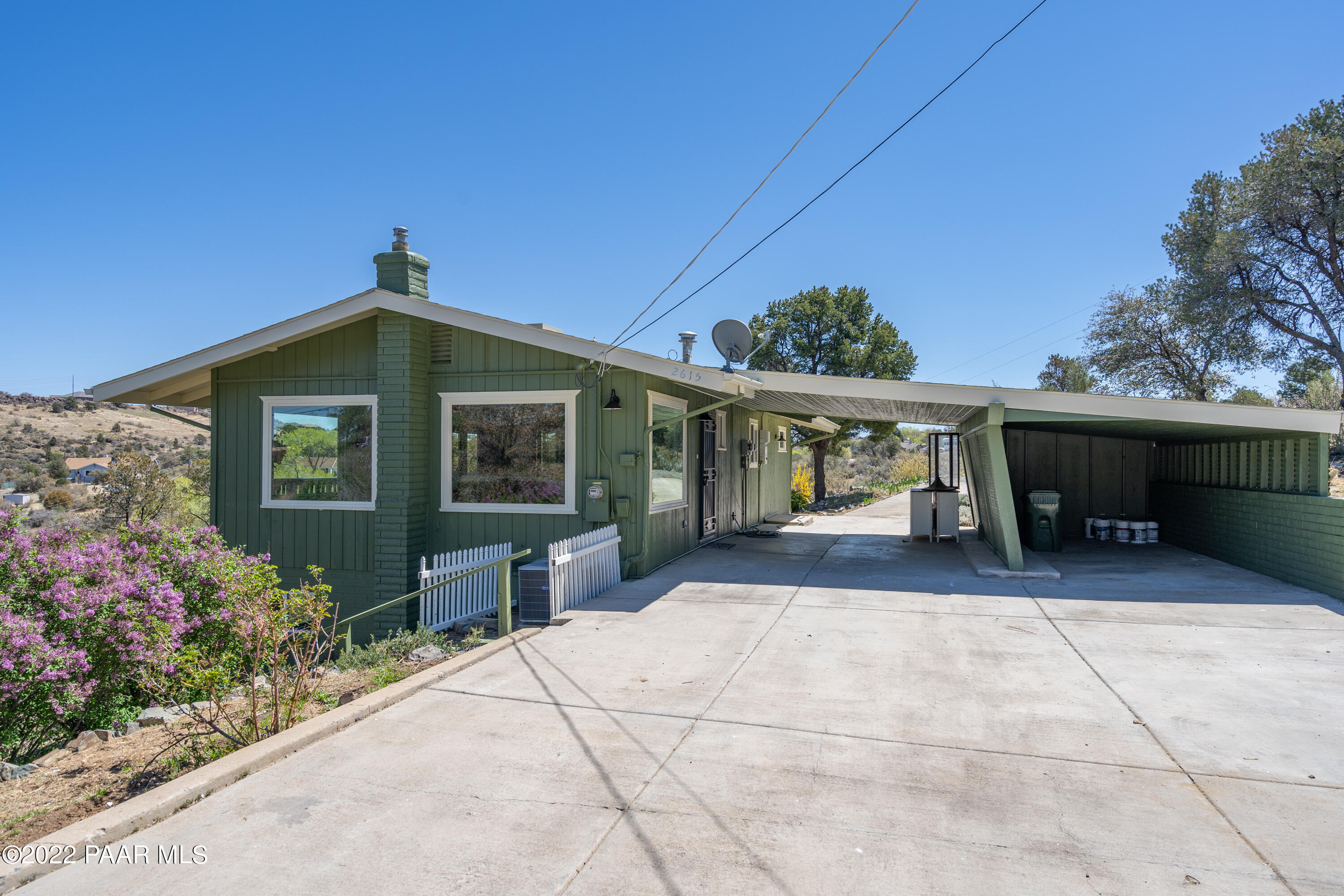 2615 Ridge Road Prescott, AZ 86301 - Photo 5 of 29 a front view of a house with garden