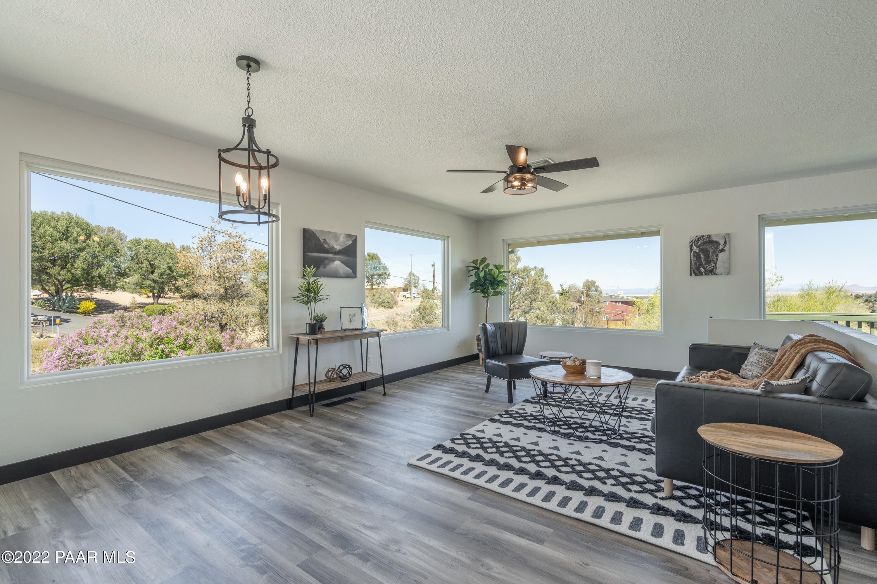 2615 Ridge Road Prescott, AZ 86301 - Photo 9 of 29 a living room with furniture a window and a flat screen tv