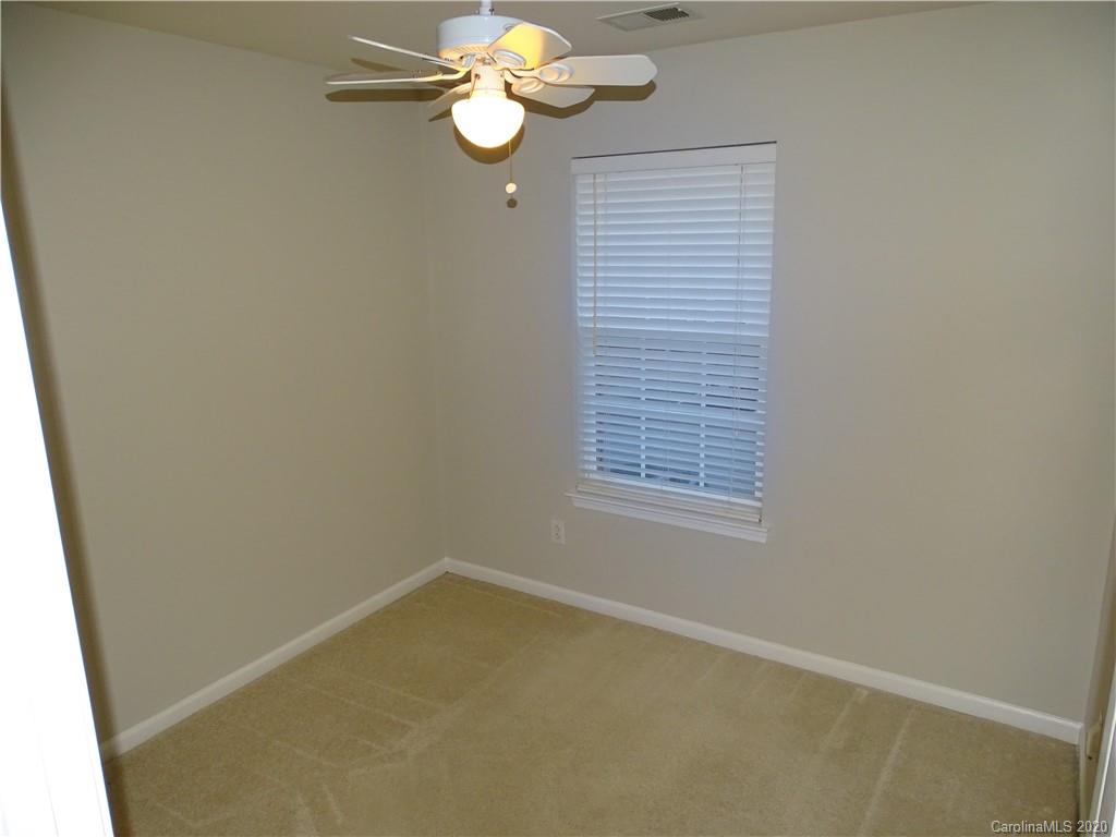 6929 Rothchild Drive Charlotte, NC 28270 - Photo 18 of 20 an empty room with a window