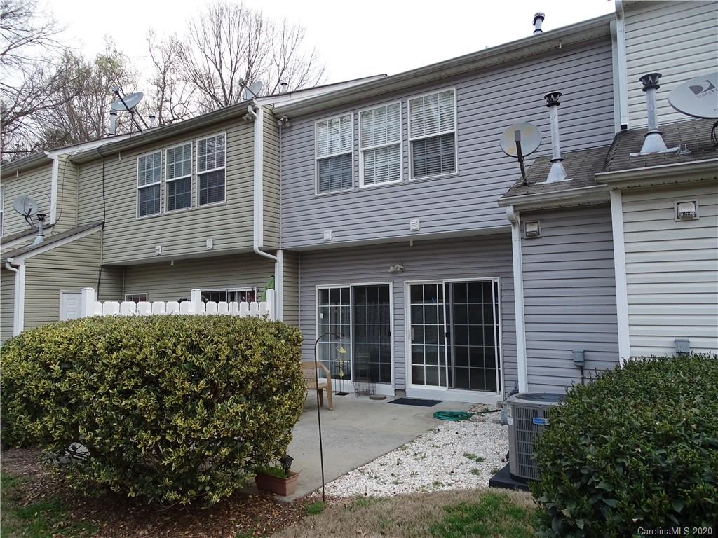 6929 Rothchild Drive Charlotte, NC 28270 - Photo 3 of 20 a front view of a house with garden