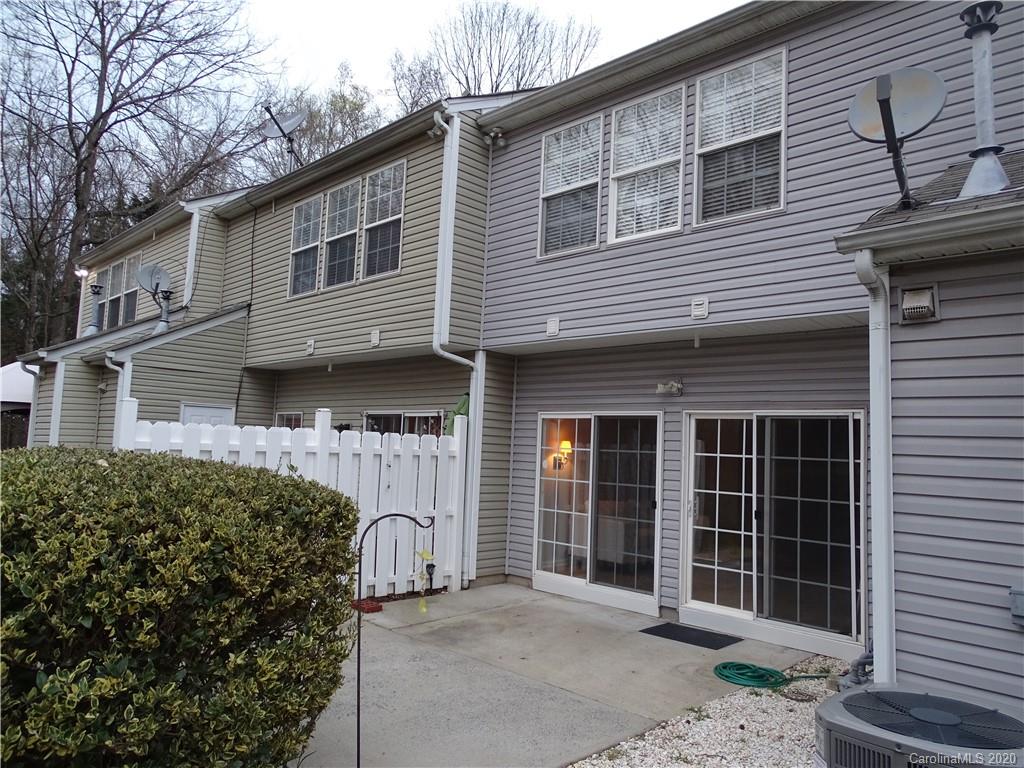 6929 Rothchild Drive Charlotte, NC 28270 - Photo 5 of 20 a front view of a house with a large window