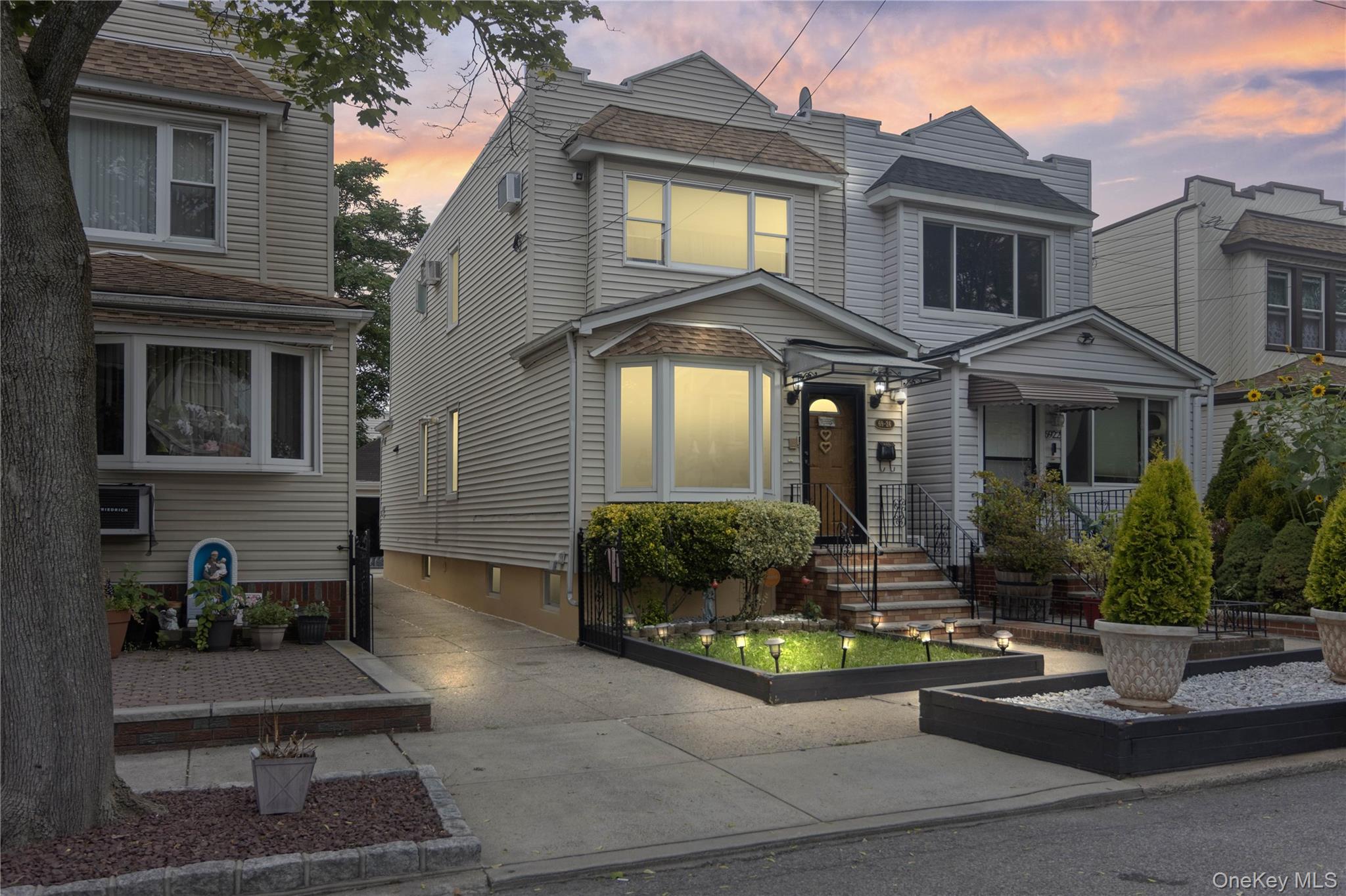 a front view of a house with yard