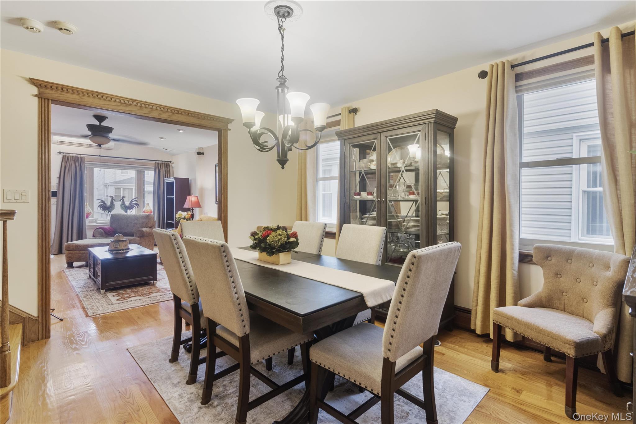 69-24 68th Place Queens, NY 11385 - Photo 6 of 26 a view of a dining room with furniture window and wooden floor
