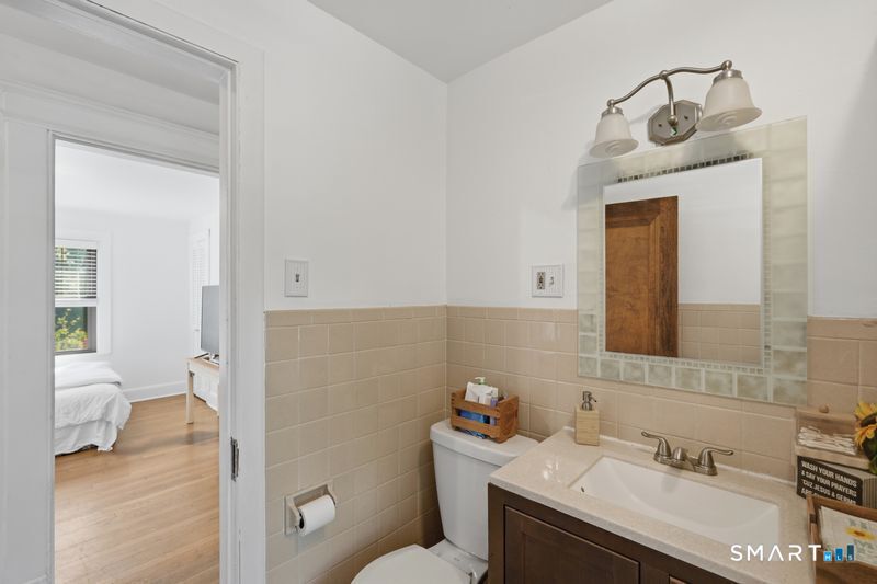 443 Highland Avenue Waterbury, CT 06708 - Photo 19 of 24 a bathroom with a sink vanity and a toilet