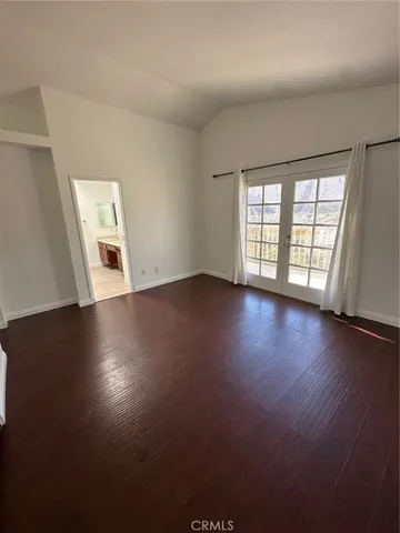 a bathroom with a double vanity sink and mirror