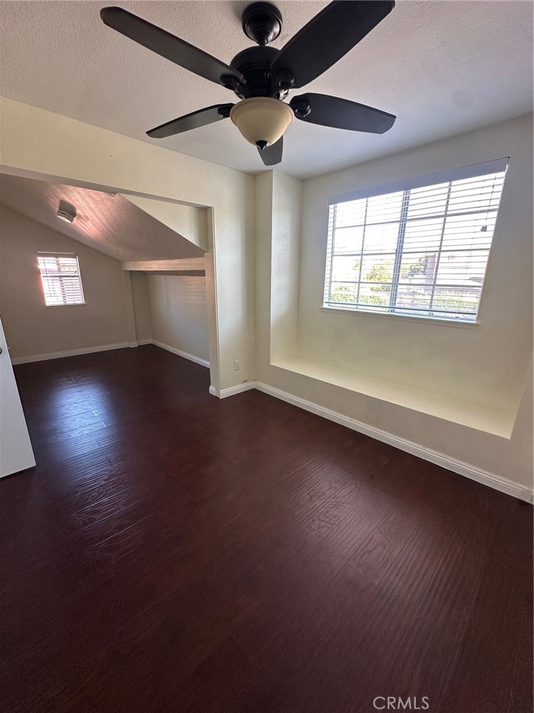 13470 Mallorca Lane Chino Hills, CA 91709 - Photo 38 of 44 a view of an empty room with wooden floor and a window