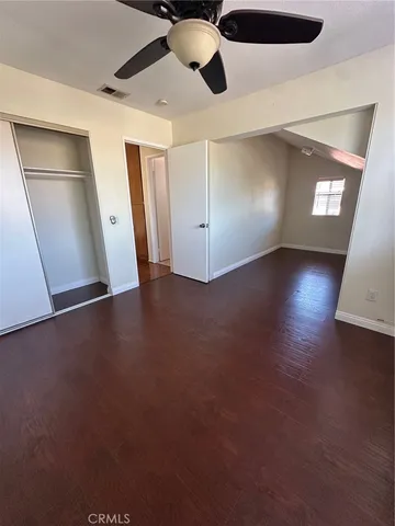 a bathroom with a double vanity sink toilet and shower