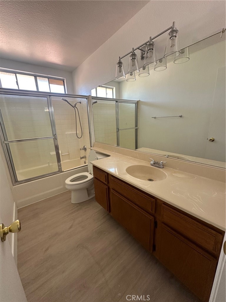 13470 Mallorca Lane Chino Hills, CA 91709 - Photo 40 of 44 a bathroom with a double vanity sink toilet and shower