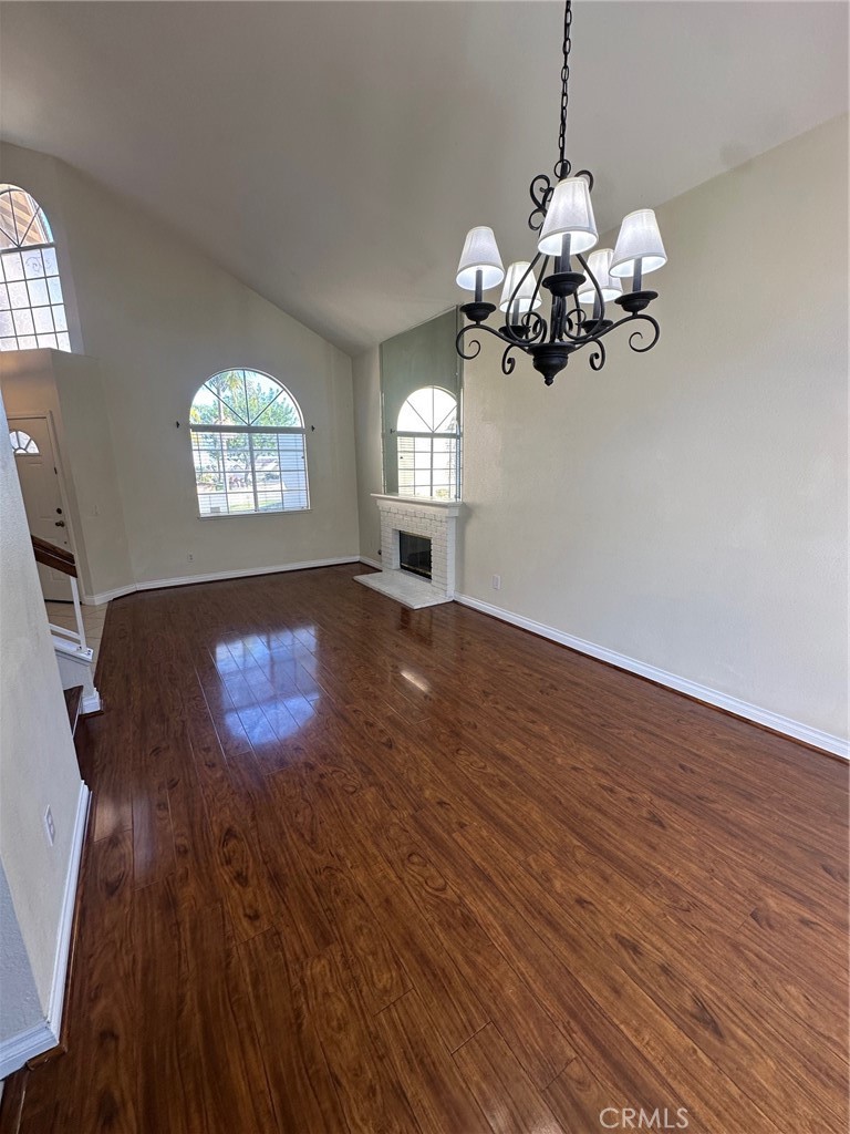13470 Mallorca Lane Chino Hills, CA 91709 - Photo 10 of 44 a view of a room with wooden floor chandelier