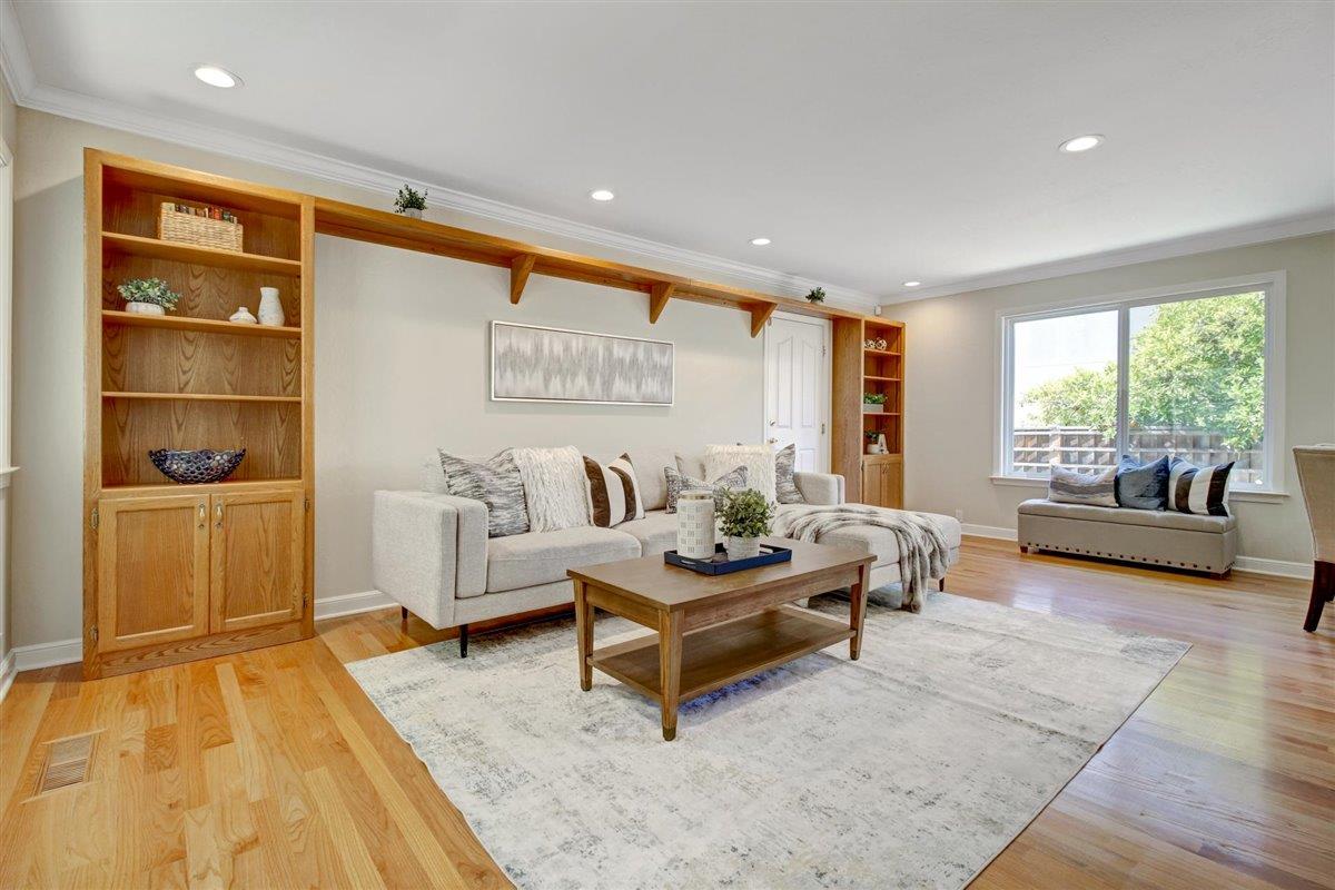 7068 Brooktree Way San Jose, CA 95120 - Photo 19 of 40 a living room with furniture and a large window