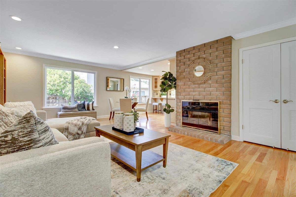 7068 Brooktree Way San Jose, CA 95120 - Photo 20 of 40 a living room with furniture and a fireplace