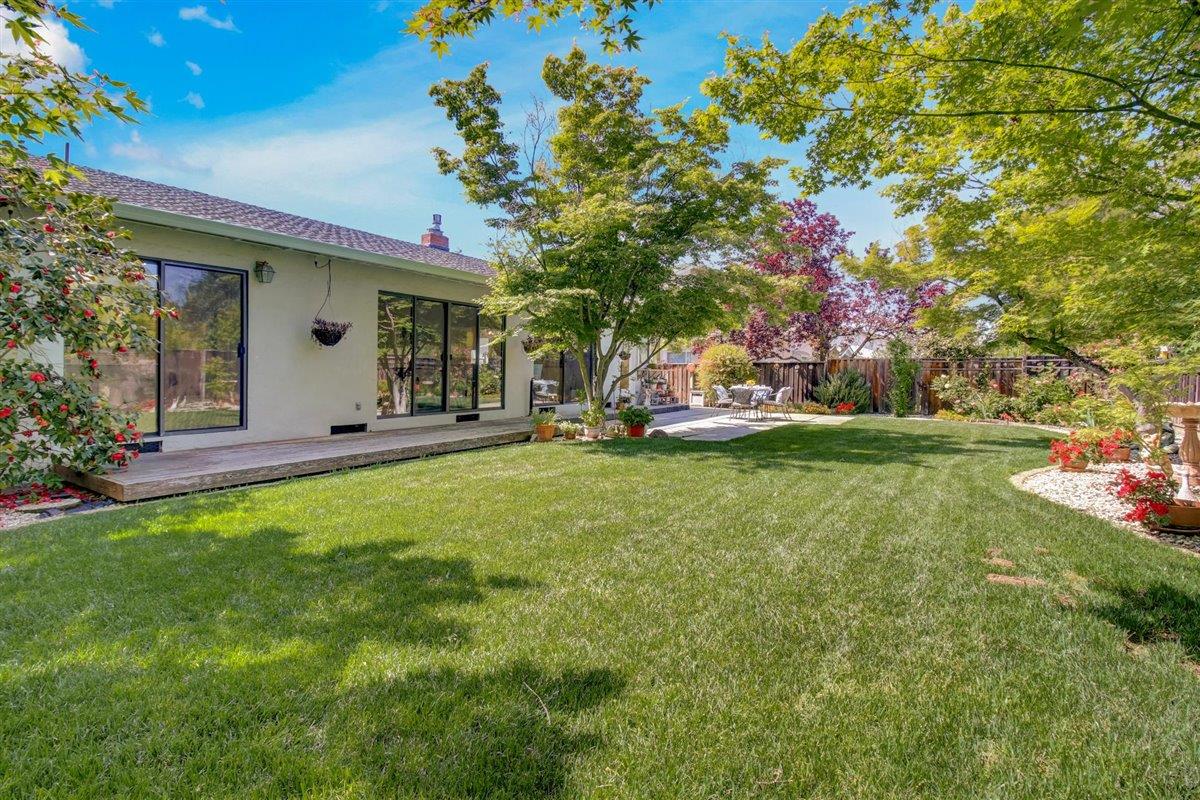 7068 Brooktree Way San Jose, CA 95120 - Photo 22 of 40 a view of a house with backyard porch and garden