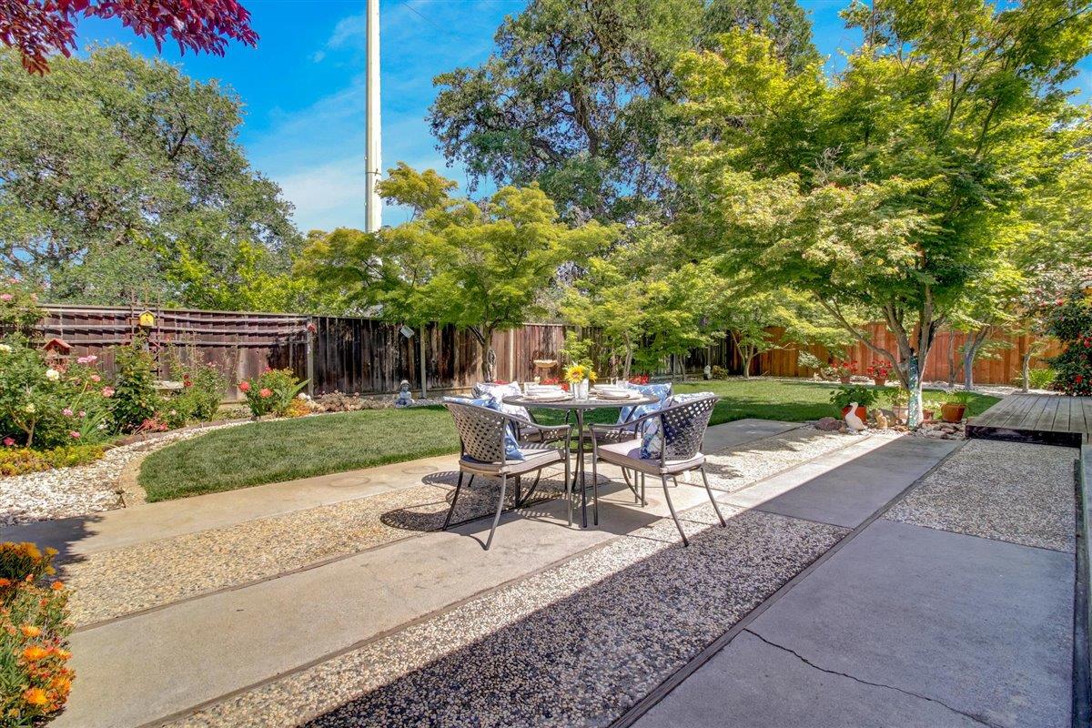 7068 Brooktree Way San Jose, CA 95120 - Photo 24 of 40 a view of a backyard with sitting area