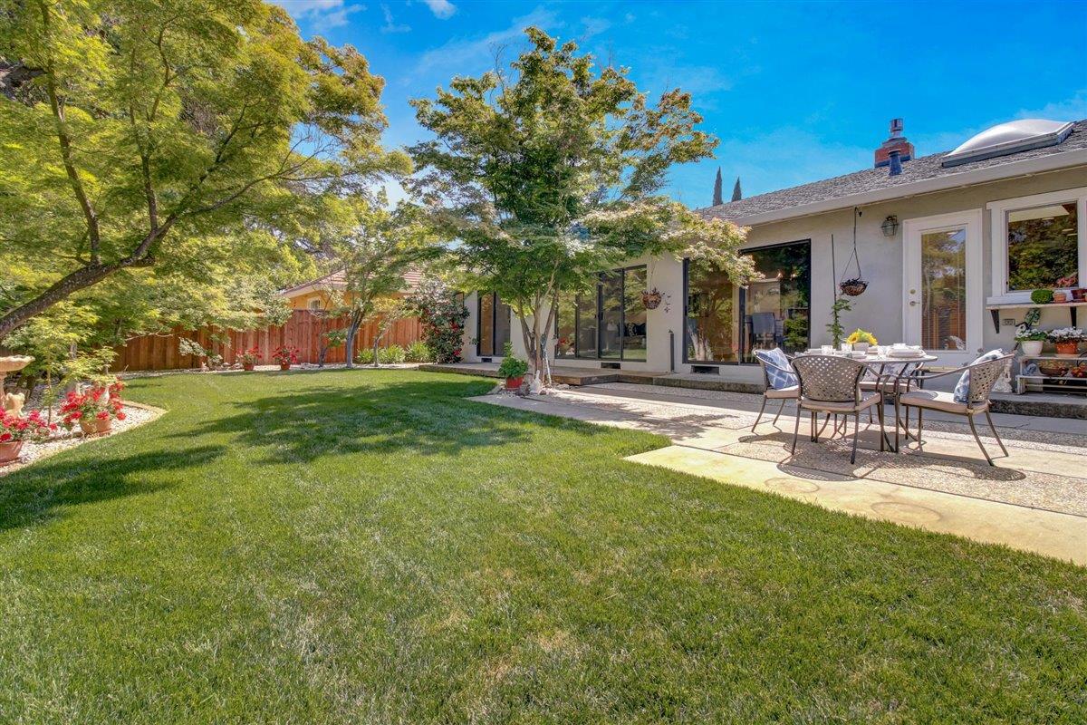 7068 Brooktree Way San Jose, CA 95120 - Photo 25 of 40 a view of a house with backyard porch and sitting area