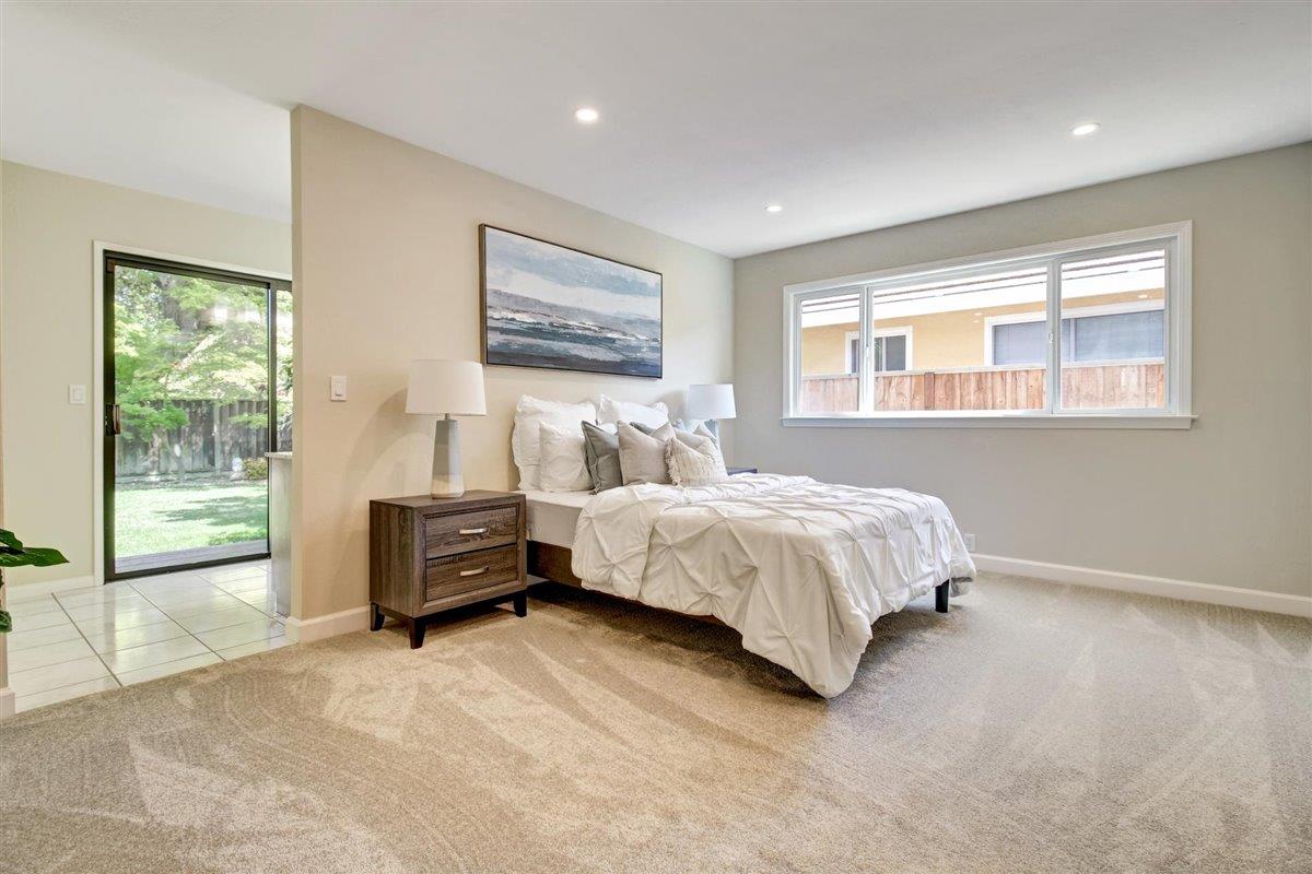 7068 Brooktree Way San Jose, CA 95120 - Photo 27 of 40 a bedroom with a bed and a window