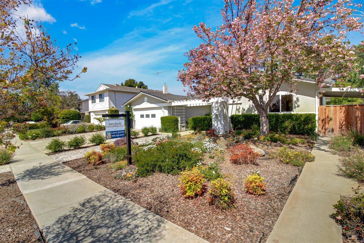 7068 Brooktree Way San Jose, CA 95120 - Photo 3 of 40 a front view of a house with garden