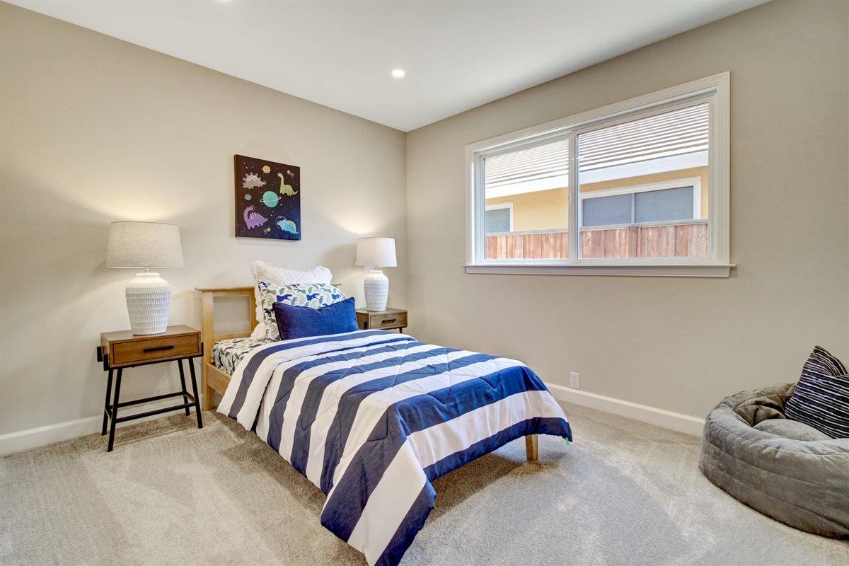 7068 Brooktree Way San Jose, CA 95120 - Photo 35 of 40 a bedroom with bed and a window