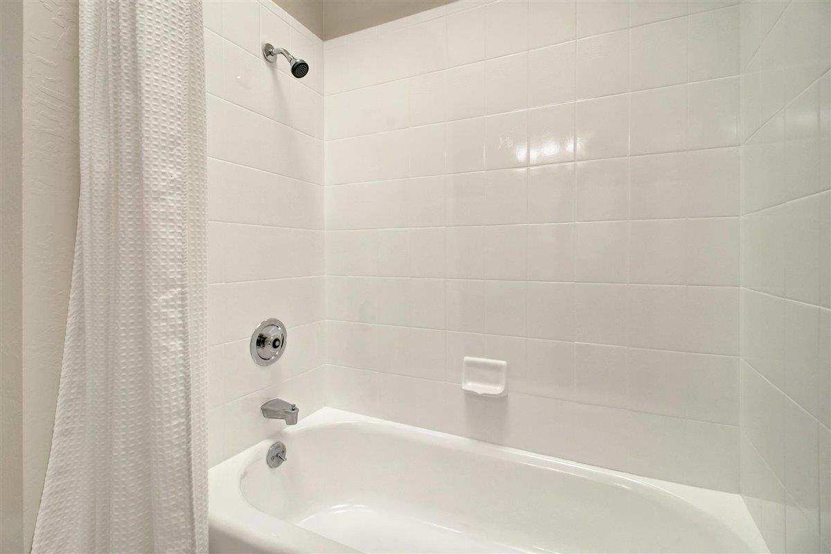 7068 Brooktree Way San Jose, CA 95120 - Photo 39 of 40 a bathroom with a bathtub