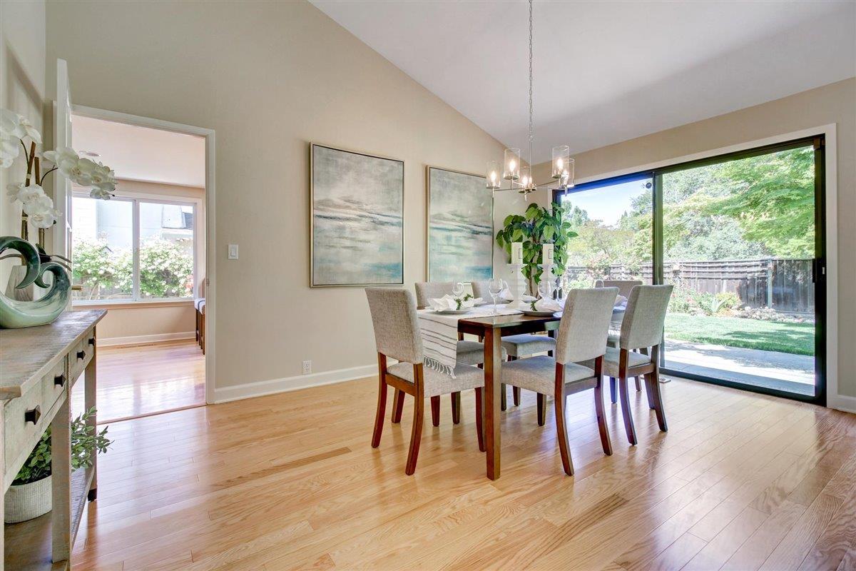 7068 Brooktree Way San Jose, CA 95120 - Photo 8 of 40 a dining room with furniture window wooden floor