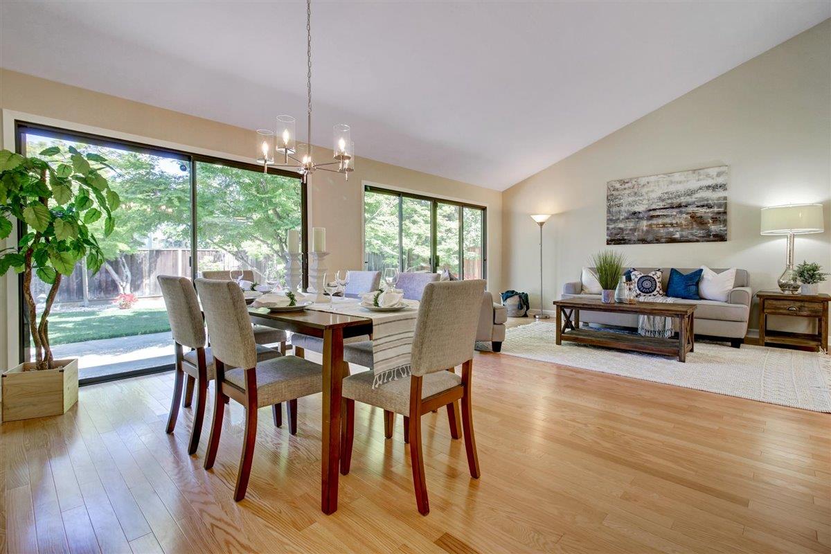 7068 Brooktree Way San Jose, CA 95120 - Photo 10 of 40 a view of a dining room with furniture window and wooden floor