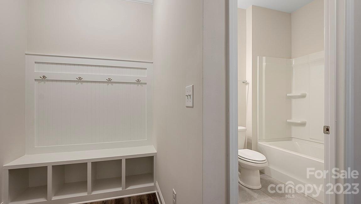149 Fox Cove Road Hendersonville, NC 28792 - Photo 13 of 34 a bathroom with a toilet and a shower