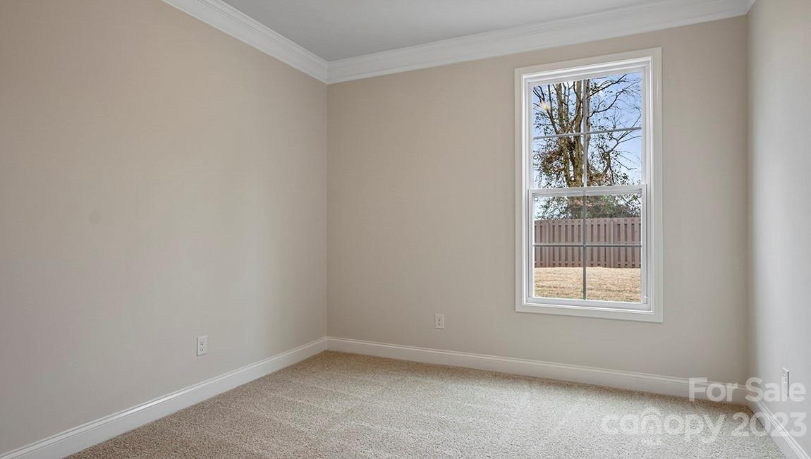 149 Fox Cove Road Hendersonville, NC 28792 - Photo 15 of 34 an empty room with a window