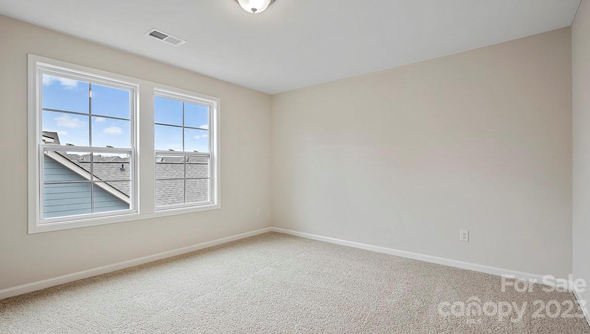 149 Fox Cove Road Hendersonville, NC 28792 - Photo 20 of 34 an empty room with a window