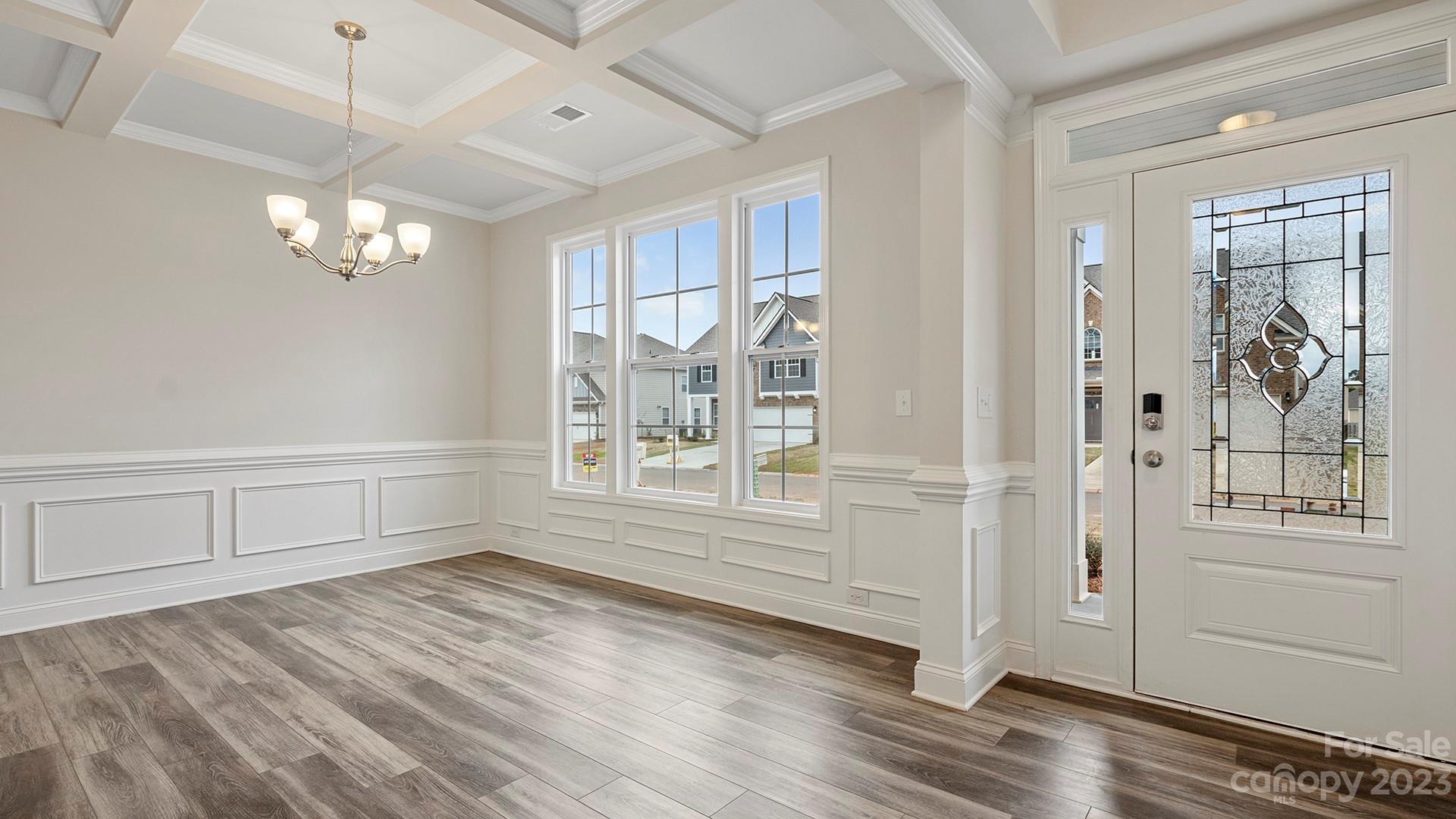 149 Fox Cove Road Hendersonville, NC 28792 - Photo 2 of 34 wooden floor in an empty room with a window
