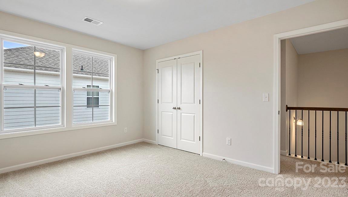 149 Fox Cove Road Hendersonville, NC 28792 - Photo 27 of 34 an empty room with windows