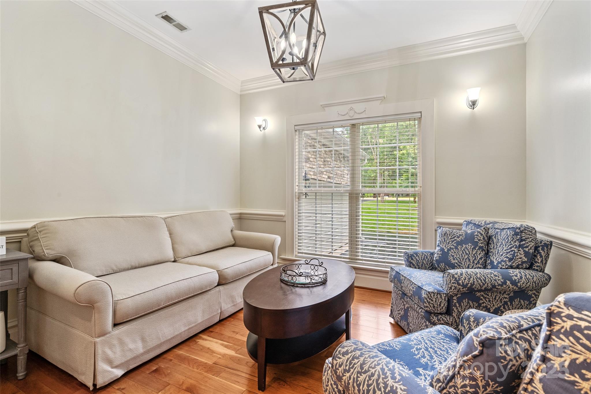 1669 Mary Ellen Drive Fort Mill, SC 29708 - Photo 16 of 48 a living room with furniture and a large window