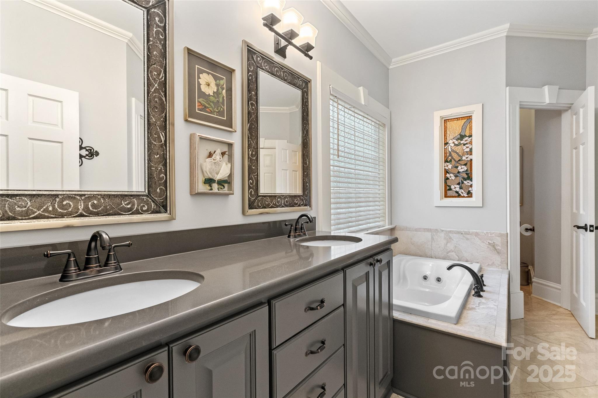 1669 Mary Ellen Drive Fort Mill, SC 29708 - Photo 19 of 48 a bathroom with a granite countertop double vanity sink and a mirror