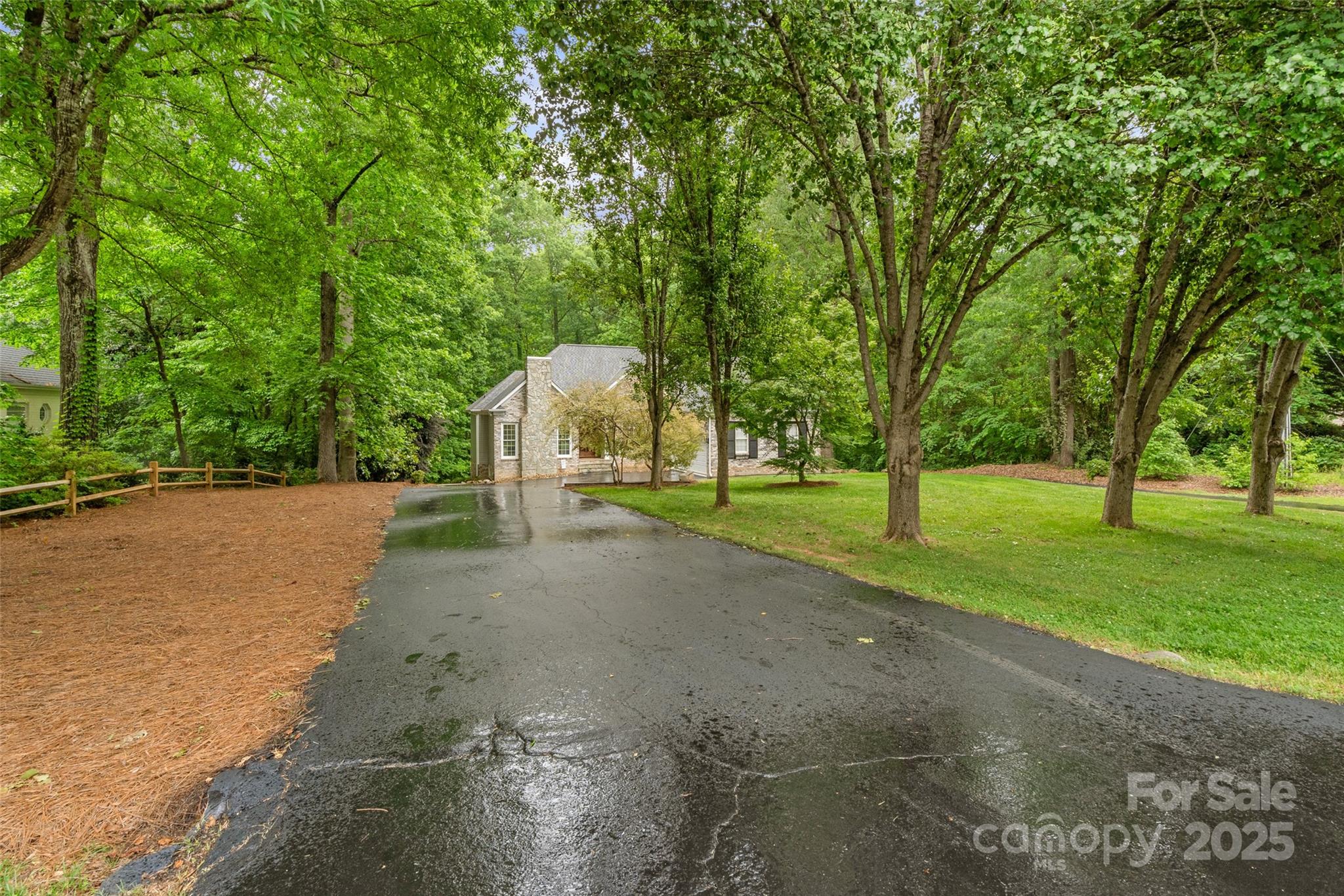 1669 Mary Ellen Drive Fort Mill, SC 29708 - Photo 2 of 48 a view of a park with large trees
