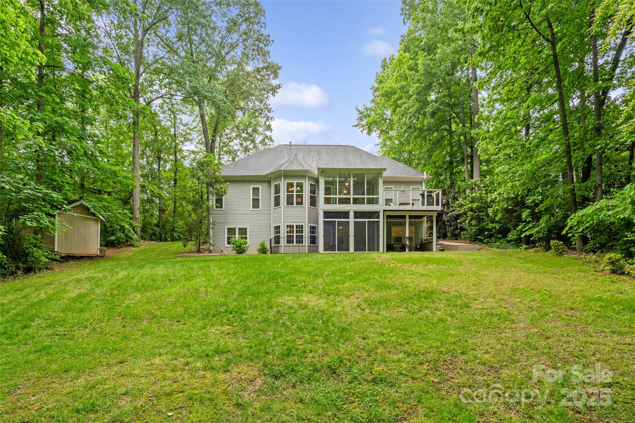 1669 Mary Ellen Drive Fort Mill, SC 29708 - Photo 43 of 48 a view of a big house with a big yard and large trees